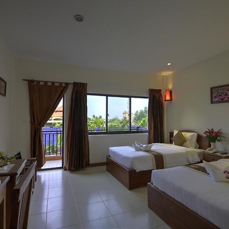 Kouprey Hotel Siem Reap Quarto foto