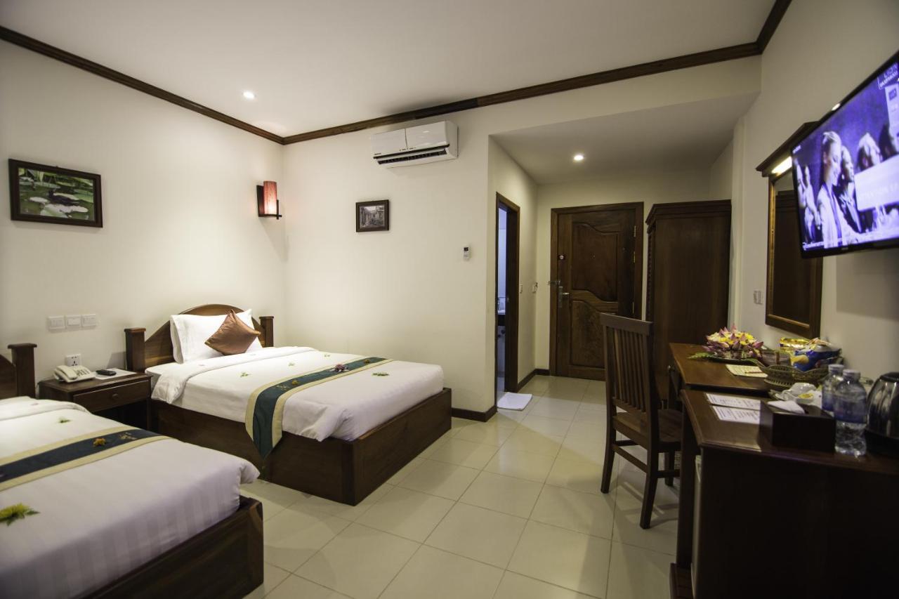 Kouprey Hotel Siem Reap Quarto foto